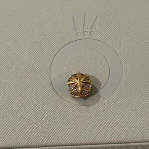 Pandora Captain Marvel insignia charm. 14k gold plated